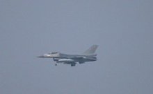      F-16,   